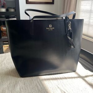Kate Spade pink interior black leather tote